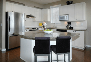 Laminate countertops and island in kitchen