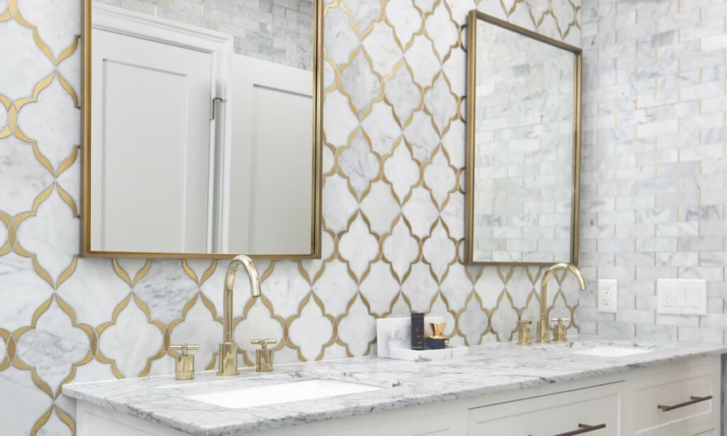 natural stone backsplash with gold metallic elements | The Floor Store