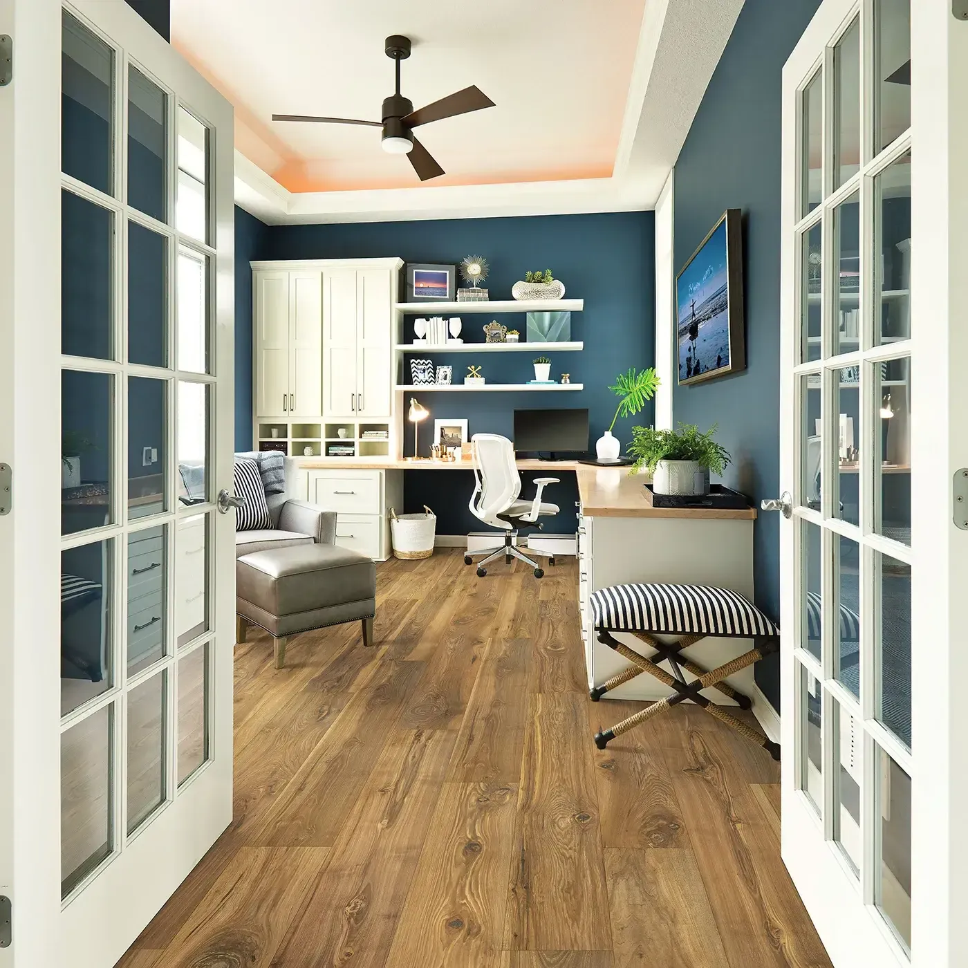 33607_03_room Laminate in a medium brown wood tone in a home office | The Floor Store