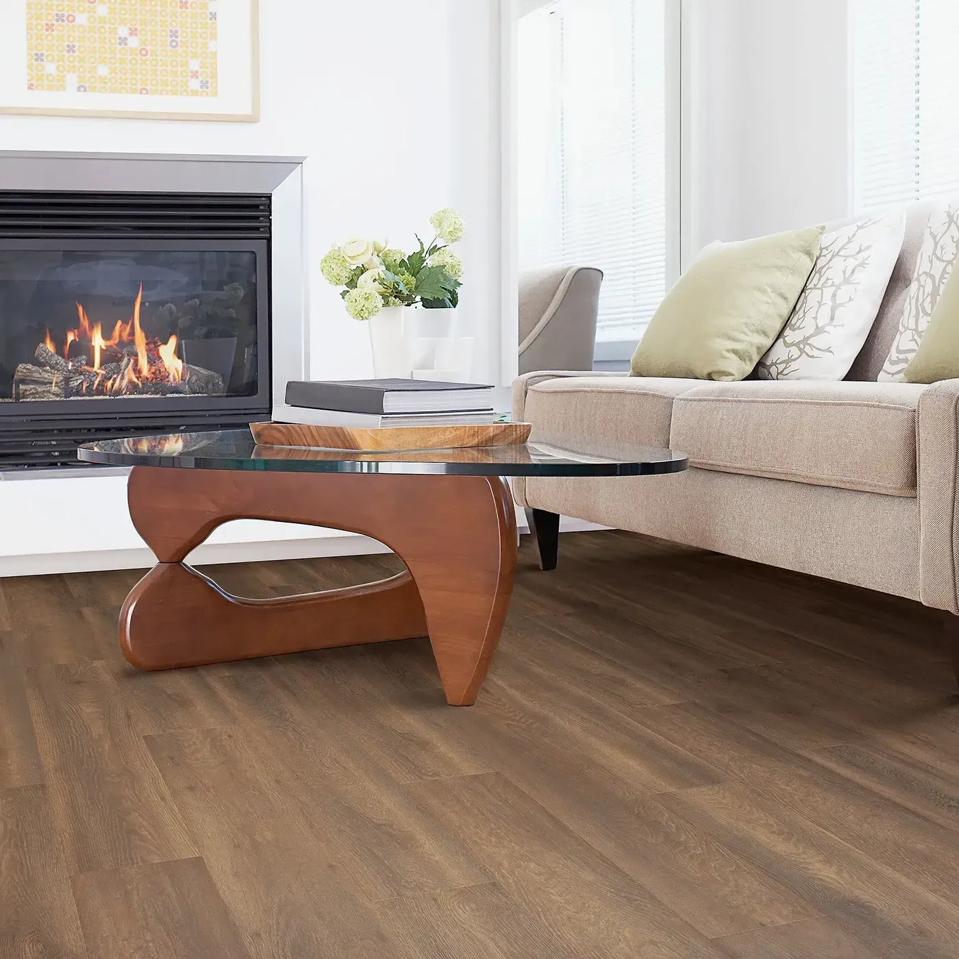 33609_04_room Laminate in a medium brown wood tone in a living room with a fireplace | The Floor Store