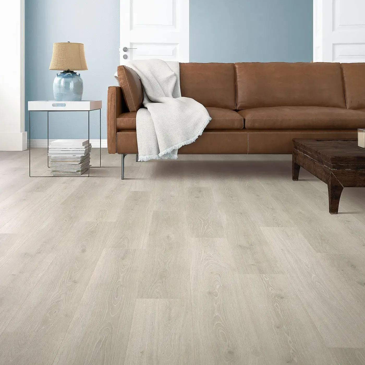 33634_03W_room-img Mohawk Laminate in a light, almost white wood tone in a living room | The Floor Store
