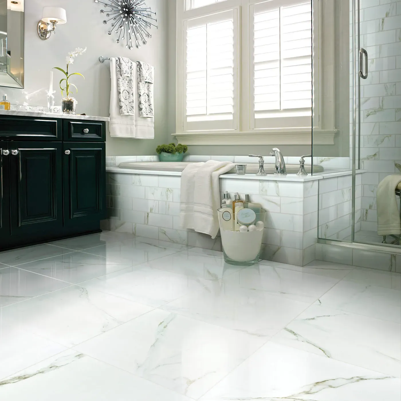 CASINO-POLISHED-CS37V-CASINO4X12-CS35V-CALACATTA-ORO-00121-V Shaw Floors Calacatta Oro polished white marble-look tile in a luxurious bathroom | The Floor Store