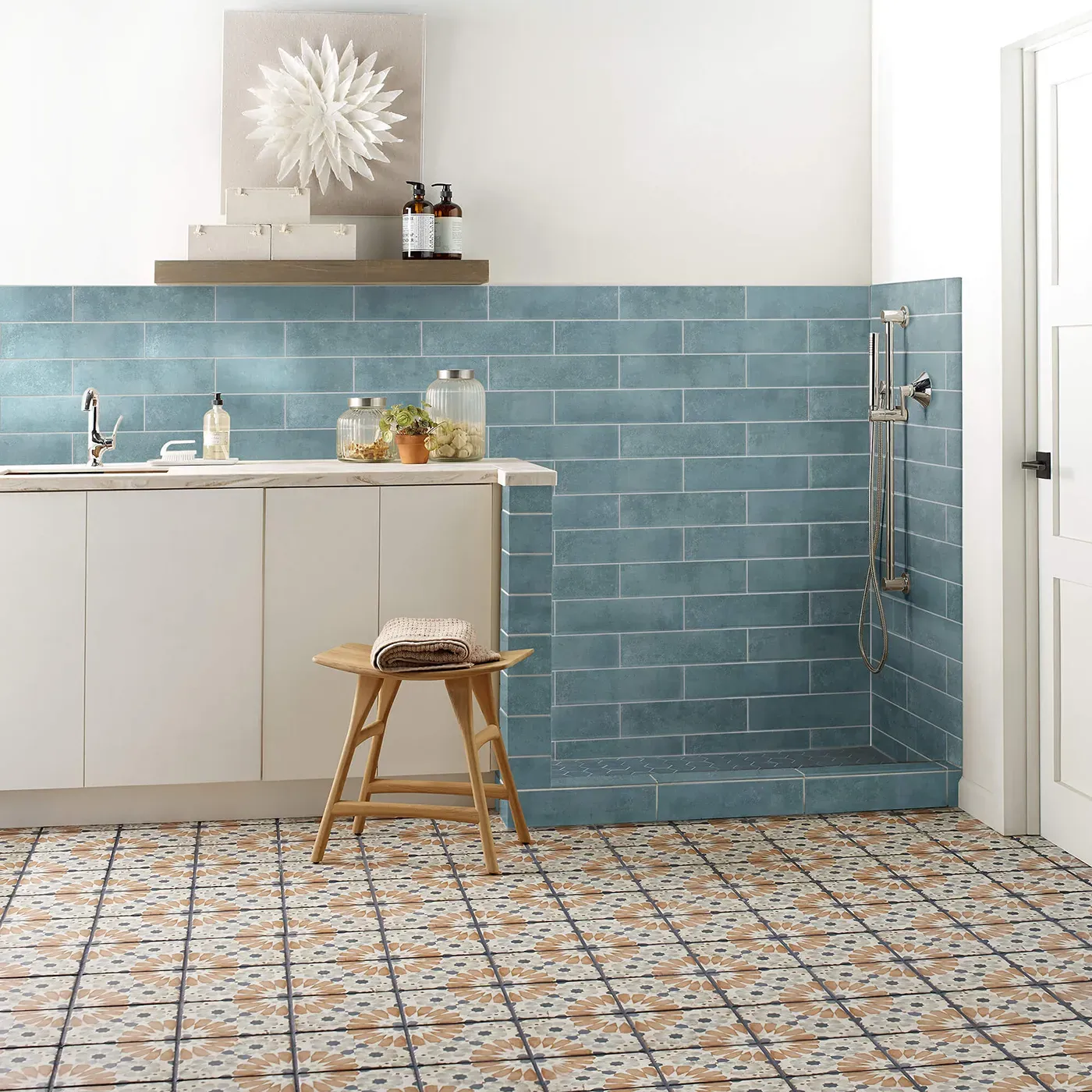 Noble-306TS-00450-Mint-3x12-RM-V Mint blue subway tile on the wall and multi-colored patterned tile on the floor | The Floor Store