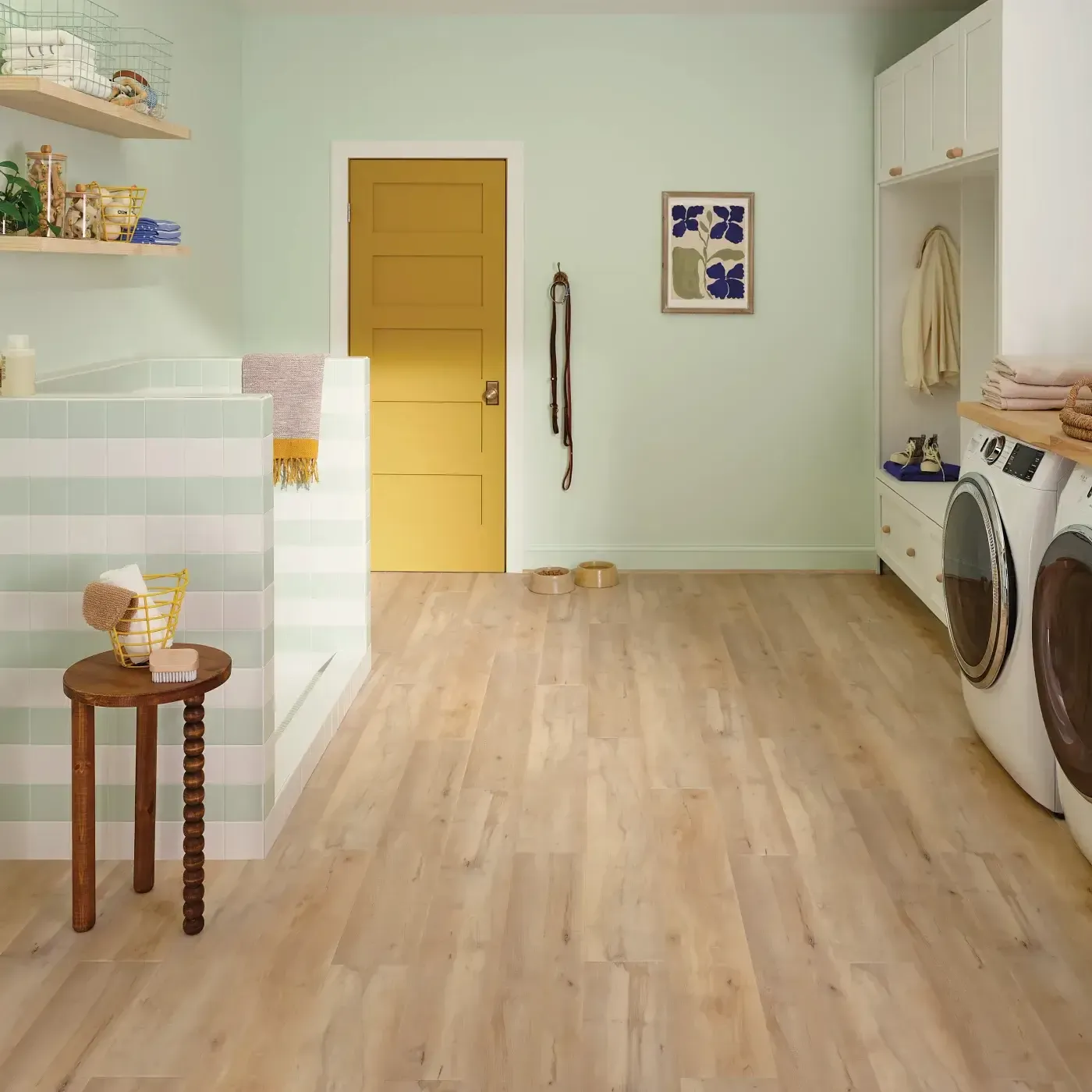 VV800_04039_ROOM COREtec Luxury Vinyl in a light blonde wood color in a laundry room | The Floor Store