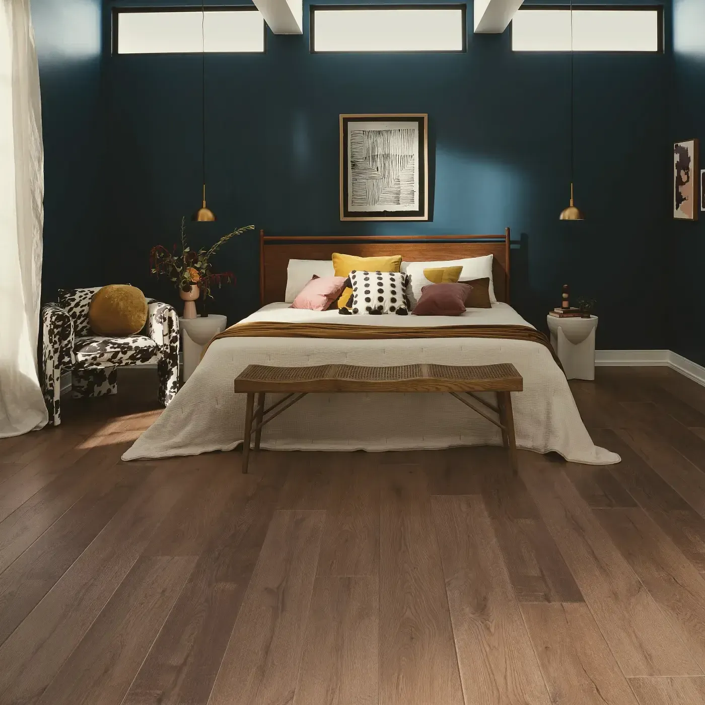 VV810_04027_ROOM COREtec Luxury Vinyl in a medium brown wood tone in a bedroom | The Floor Store