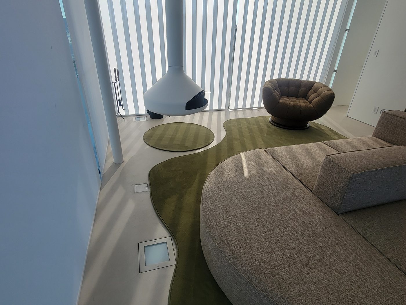 Custom-shaped area rug in a living room
