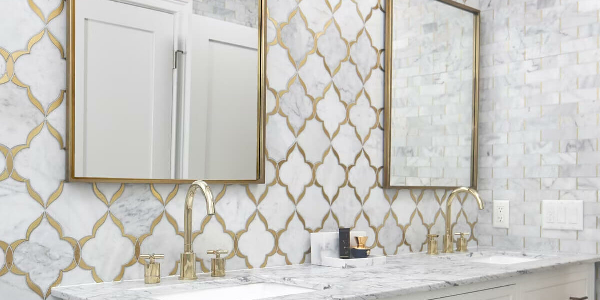 natural stone backsplash with gold metallic elements | The Floor Store